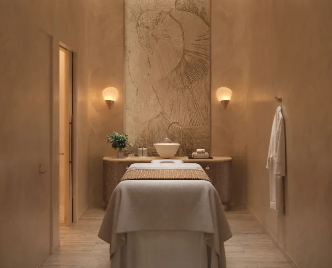 Spa treatment room with warm lighting